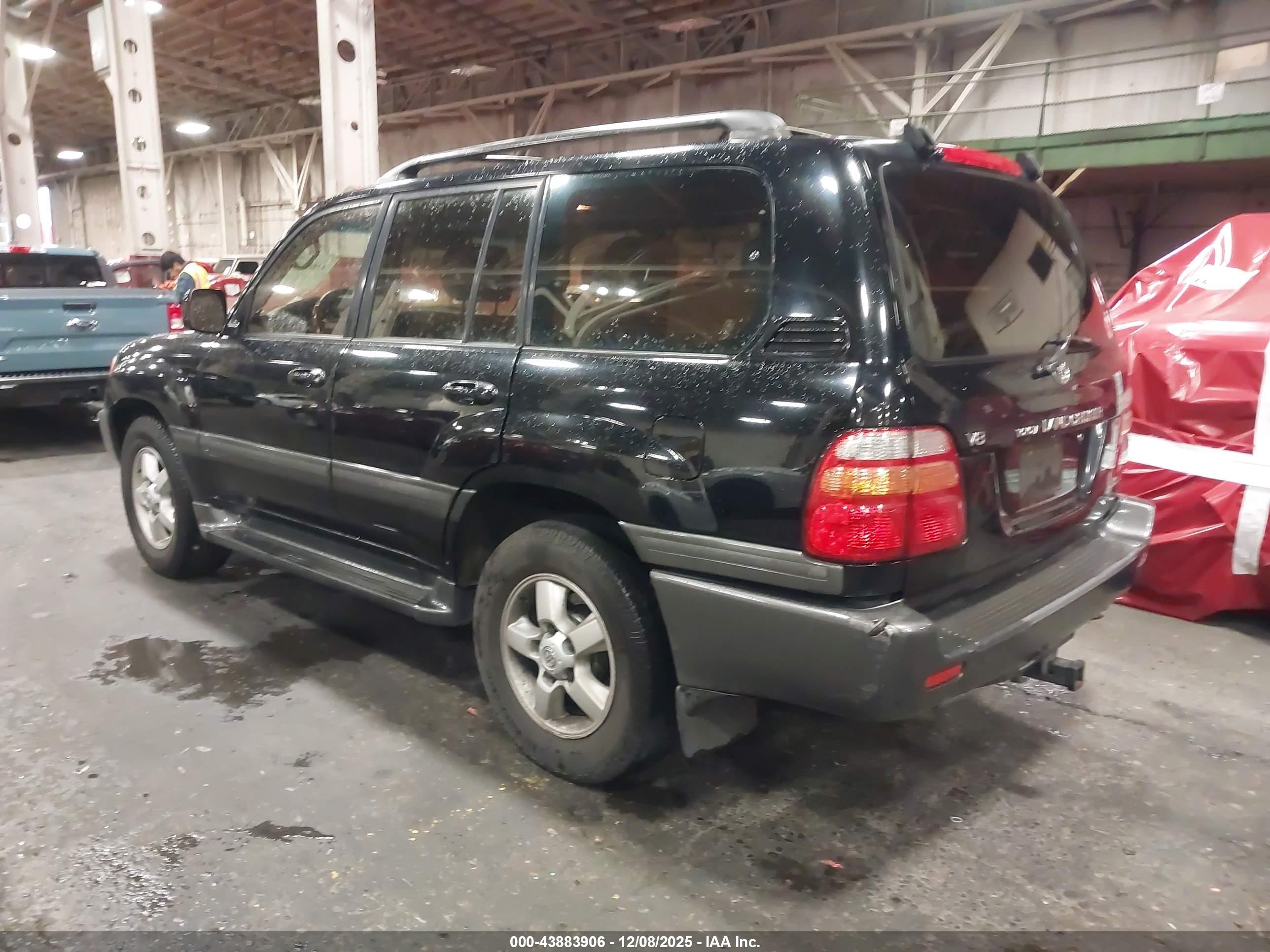 2001 Toyota Land Cruiser   Черный vin: JTEHT05JX12010743