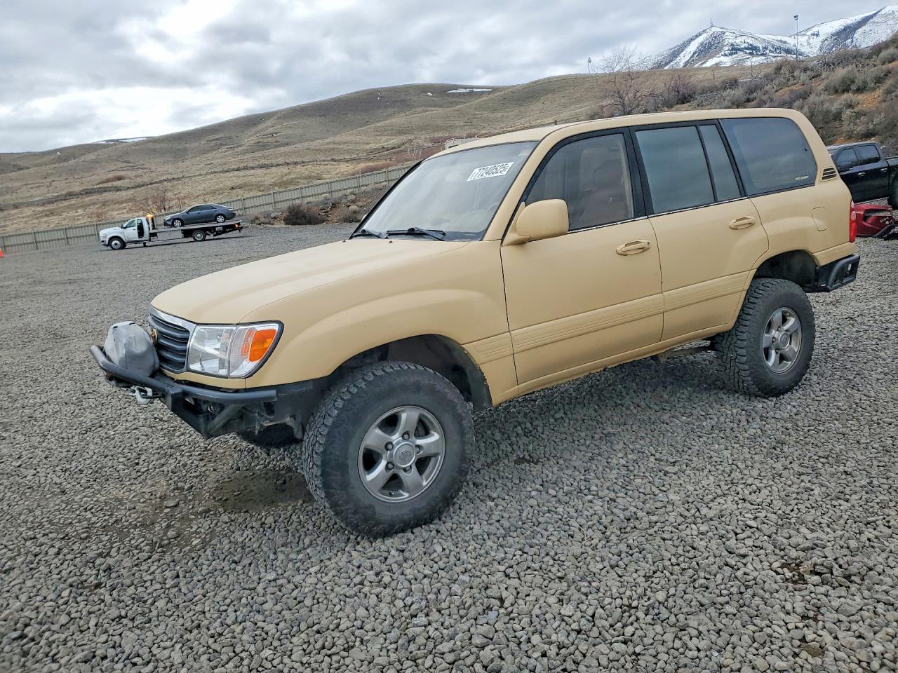 2002 Toyota Land Cruiser Base Tan vin: JTEHT05JX22028211