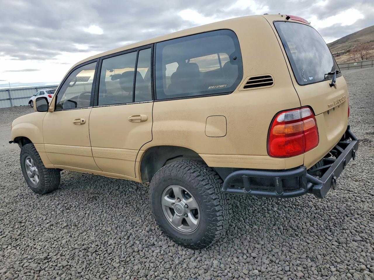 2002 Toyota Land Cruiser Base Tan vin: JTEHT05JX22028211