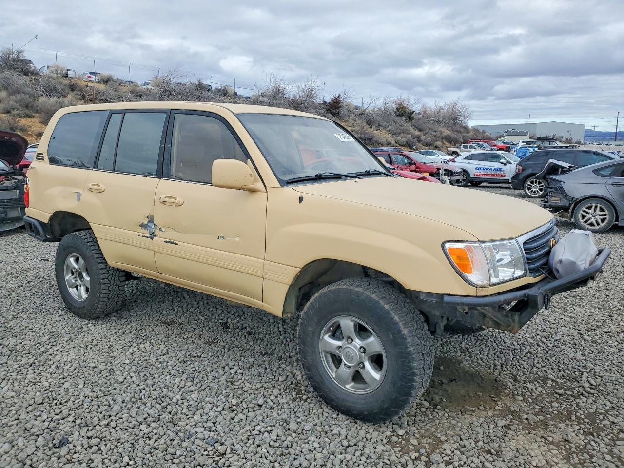 2002 Toyota Land Cruiser Base Tan vin: JTEHT05JX22028211