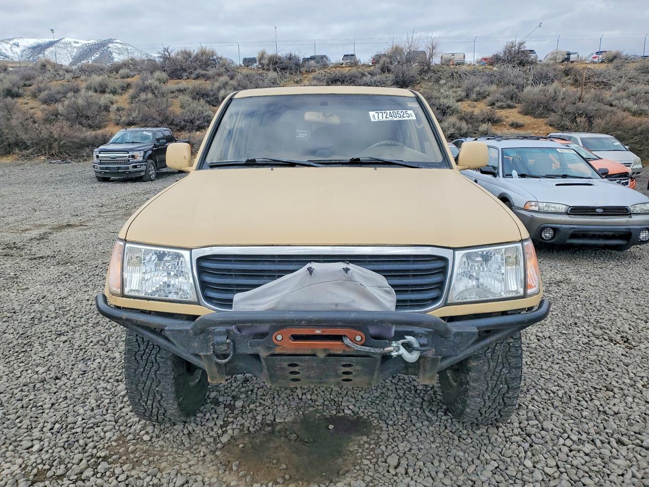 2002 Toyota Land Cruiser Base Tan vin: JTEHT05JX22028211