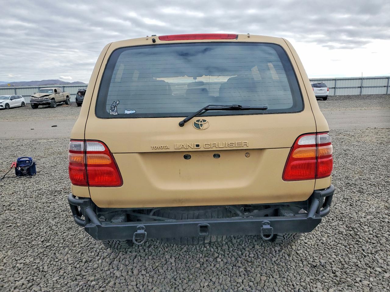 2002 Toyota Land Cruiser Base Tan vin: JTEHT05JX22028211