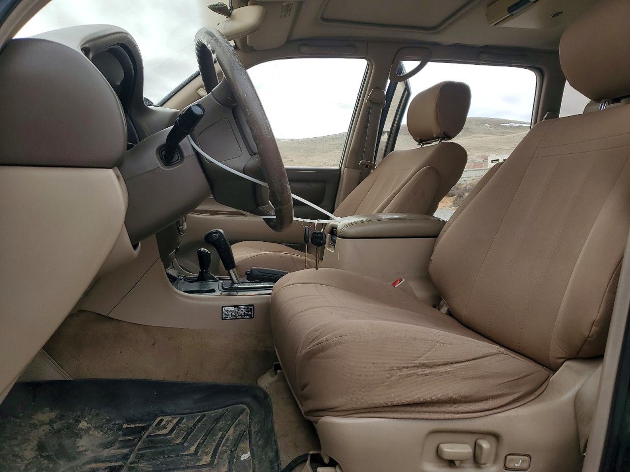 2002 Toyota Land Cruiser Base Tan vin: JTEHT05JX22028211