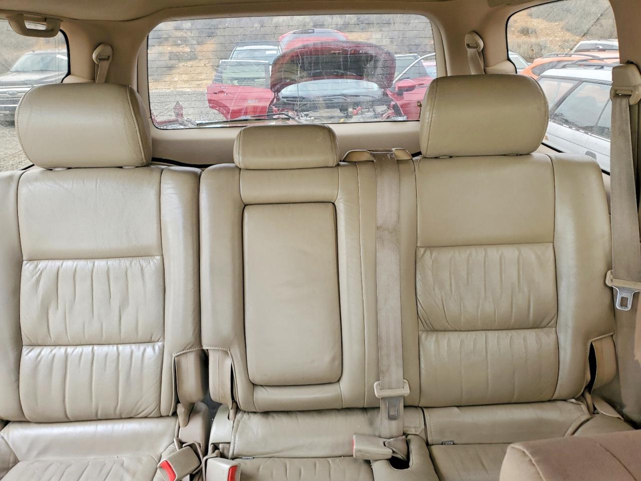 2002 Toyota Land Cruiser Base Tan vin: JTEHT05JX22028211
