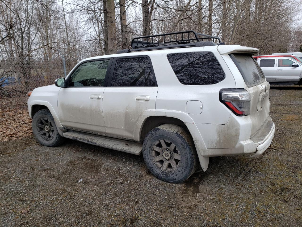 2022 Toyota 4runner Trail White vin: JTETU5JR5N6000569 Damage: Rear Bumper, Heavy Scratch, 2 to 3 inches