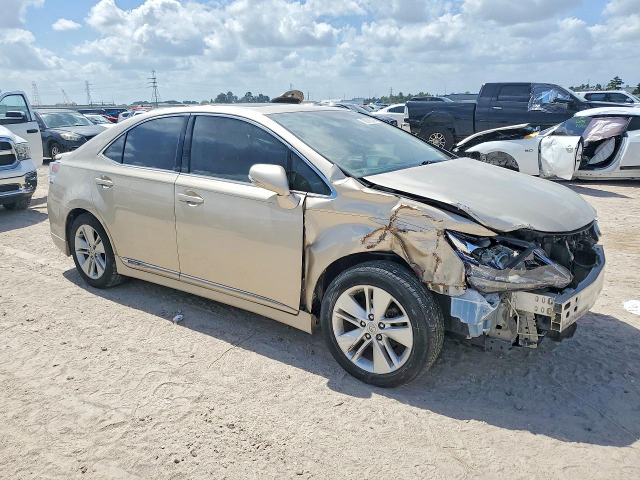 2011 Lexus Hs 250h Gold vin: JTHBB1BA5B2046718