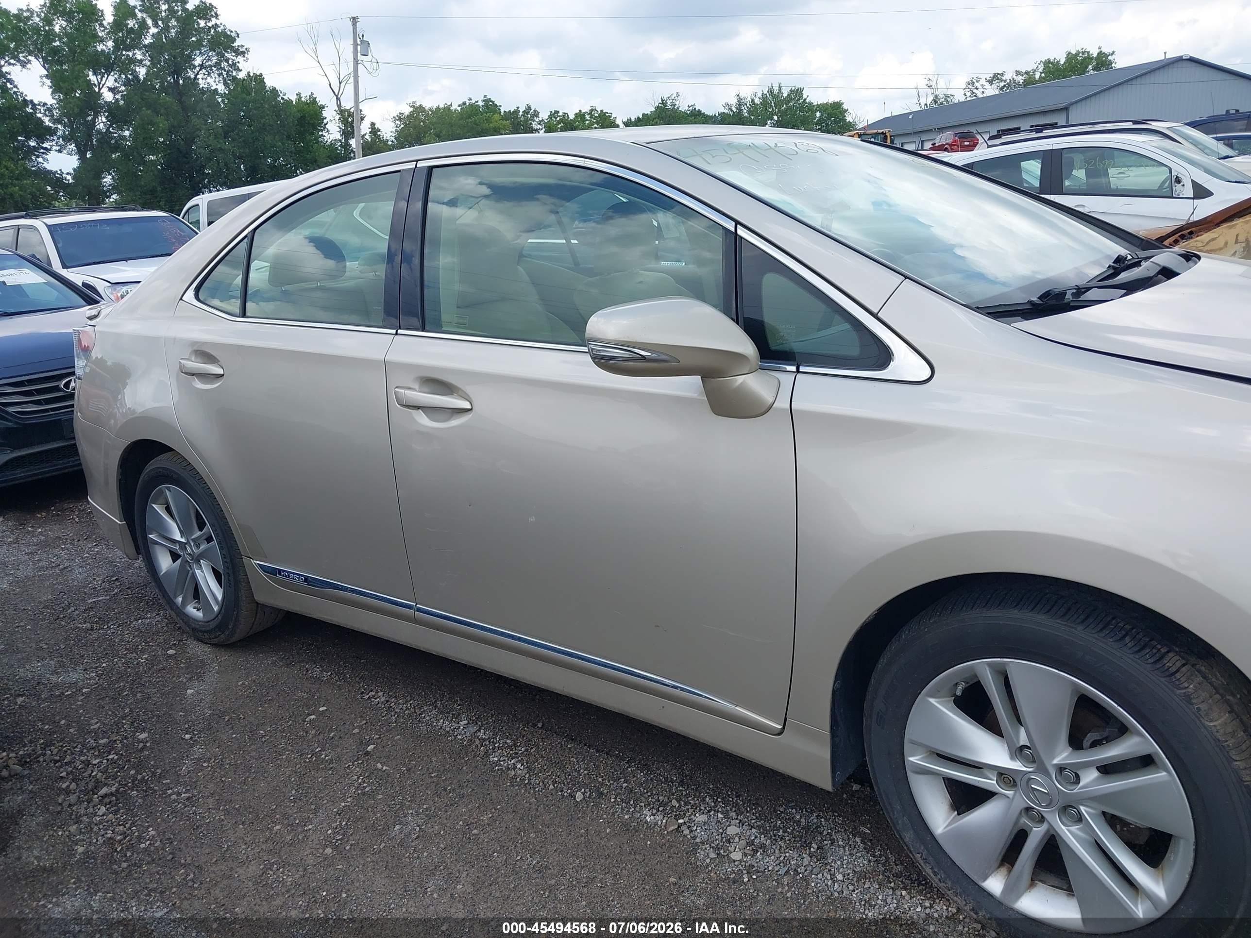 2011 Lexus Hs 250h   Gold vin: JTHBB1BA7B2048356