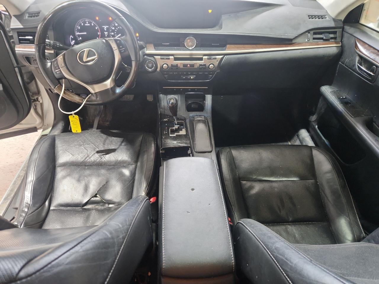 2015 Lexus Es 350 Silver vin: JTHBK1GGXF2207244 Damage: Front Center Armrest, Burn Hole, 1/8 To 1/2 Inch