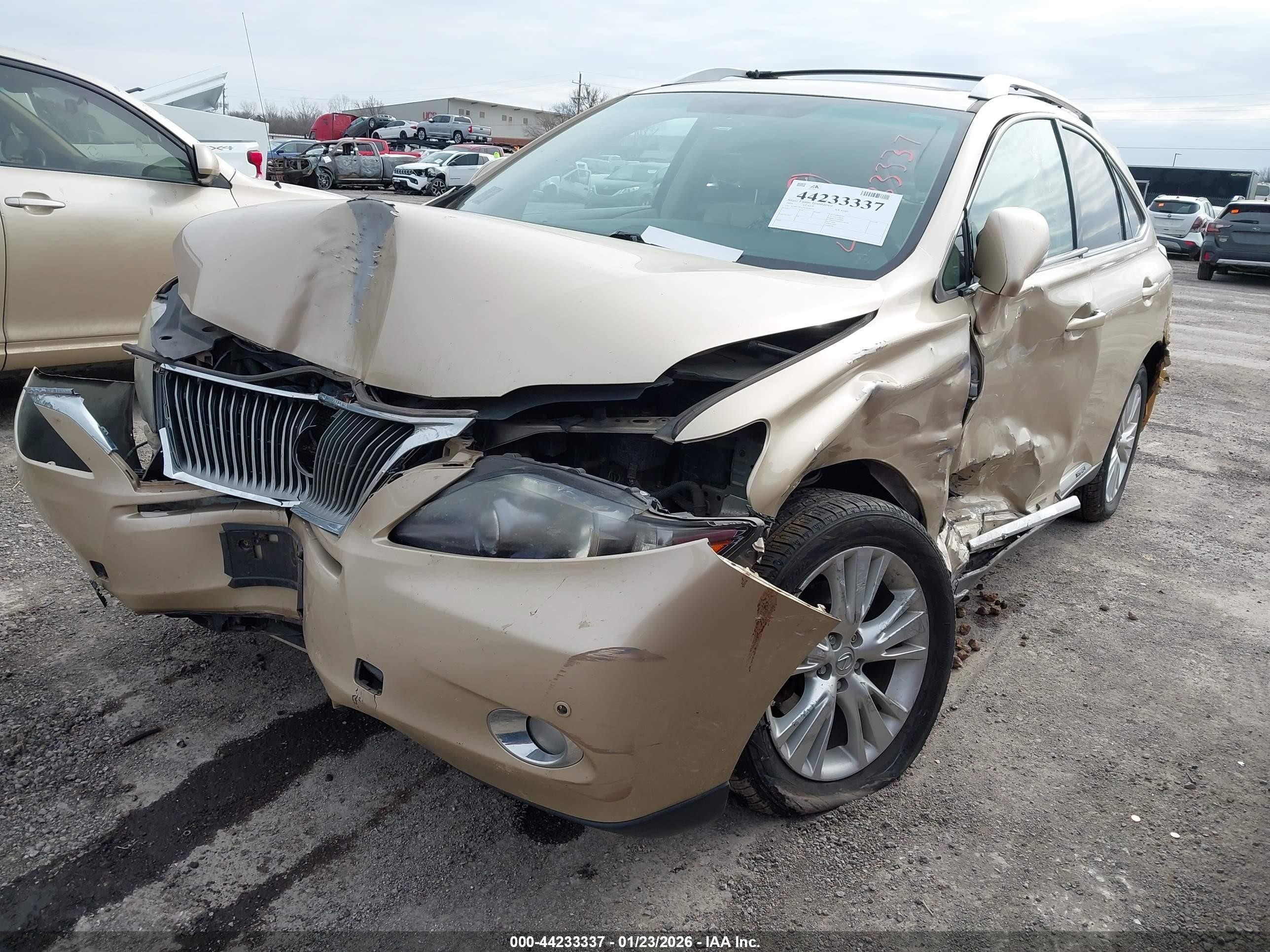 2010 Lexus Rx 450h Gold vin: JTJBC1BA2A2024024