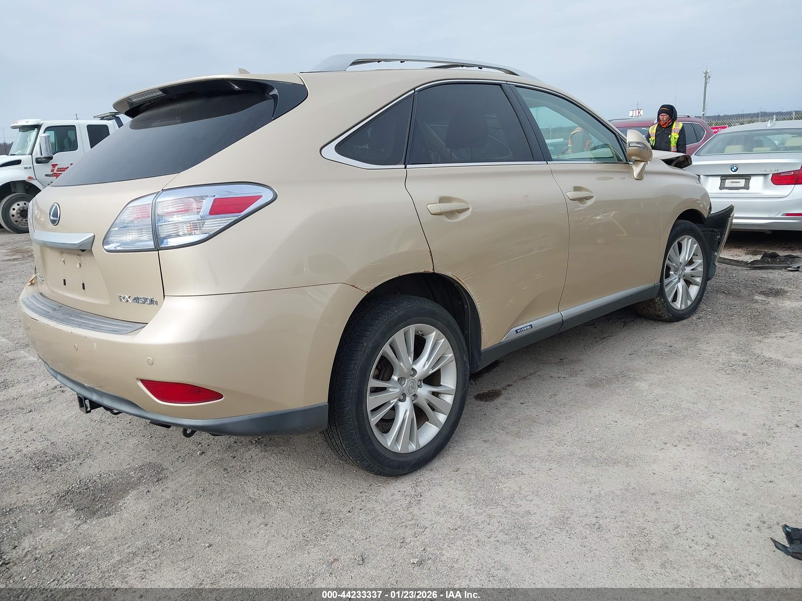 2010 Lexus Rx 450h Gold vin: JTJBC1BA2A2024024