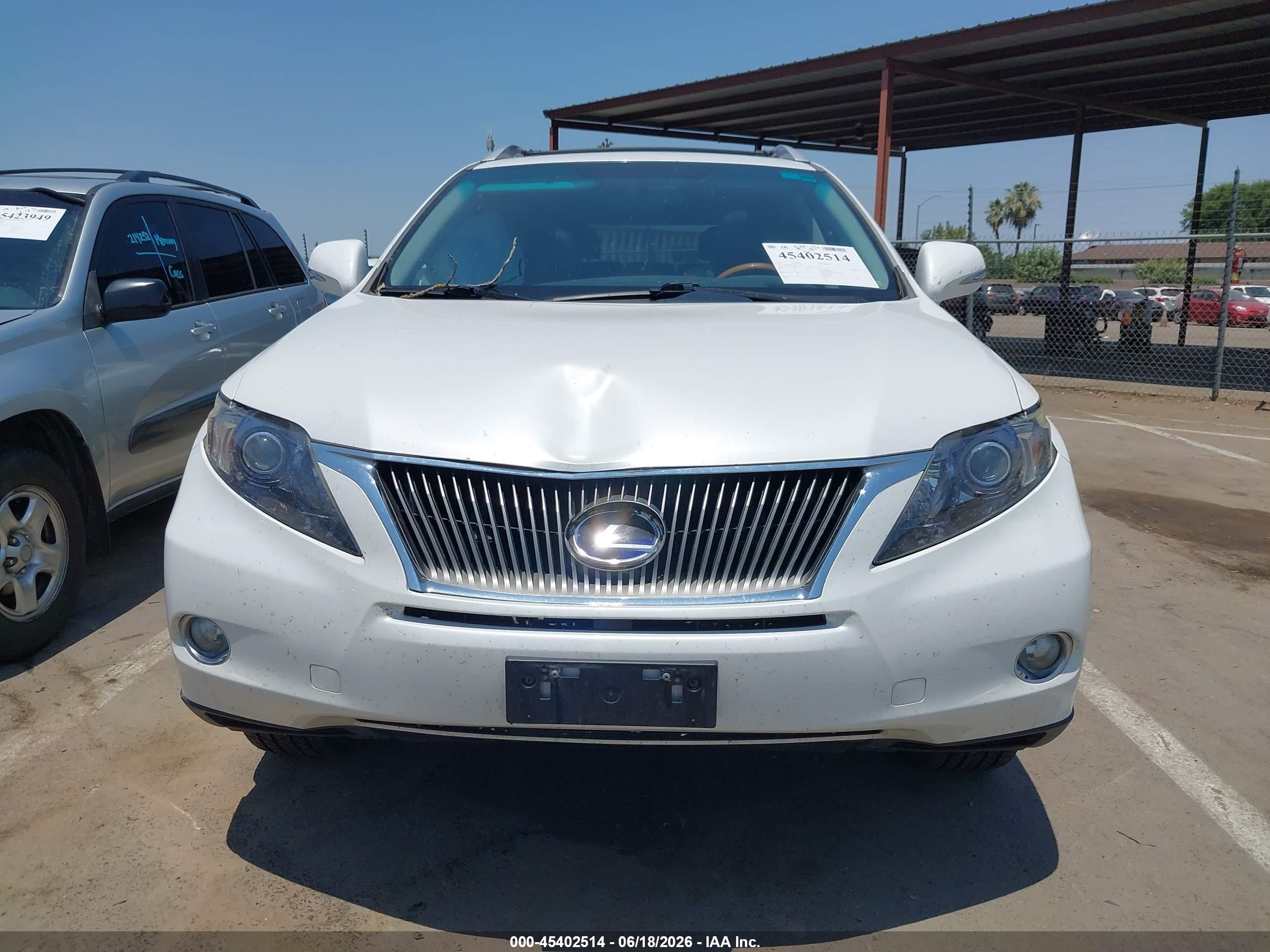 2012 Lexus Rx 450h   White vin: JTJBC1BA6C2425367