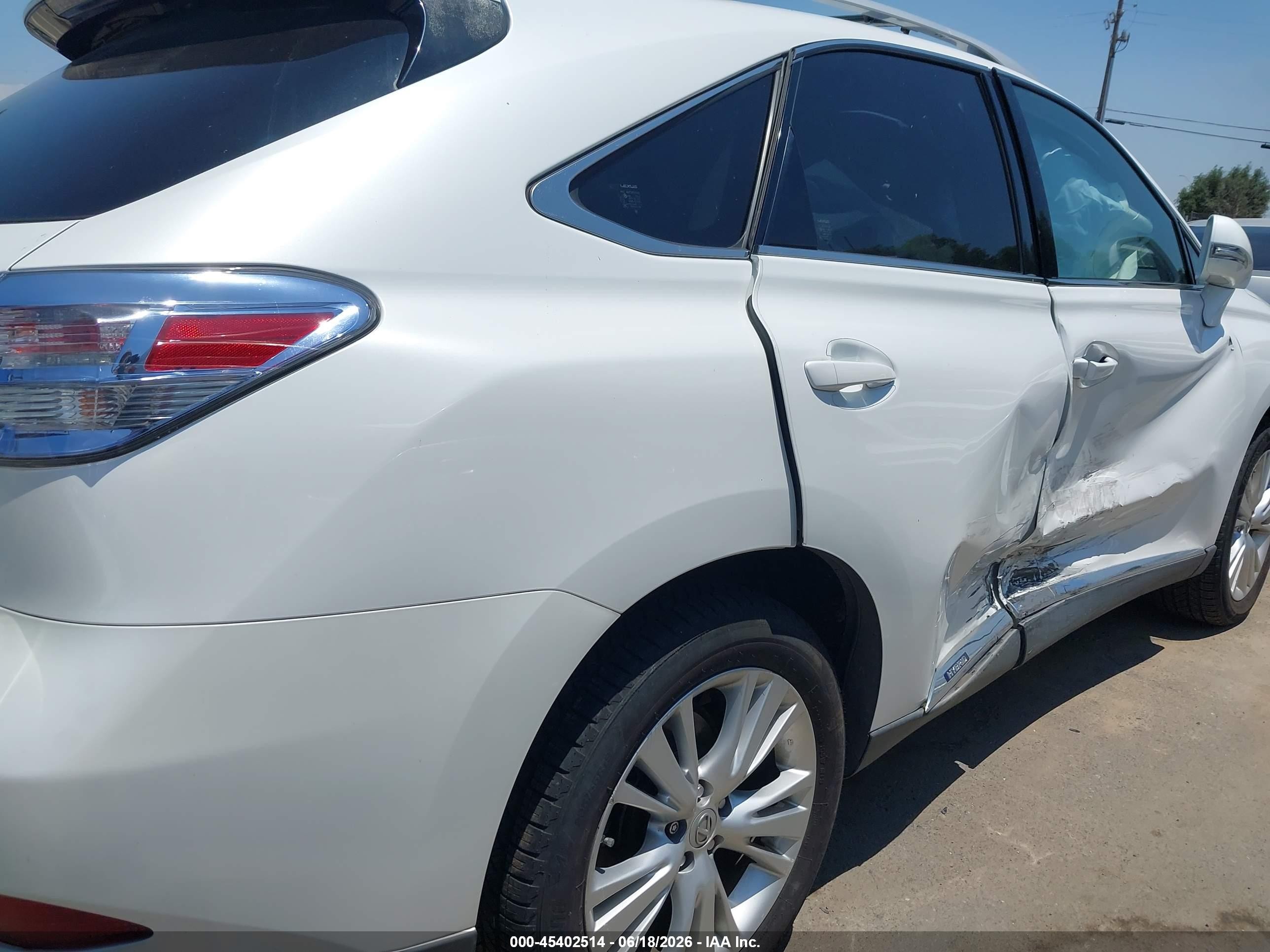 2012 Lexus Rx 450h   White vin: JTJBC1BA6C2425367