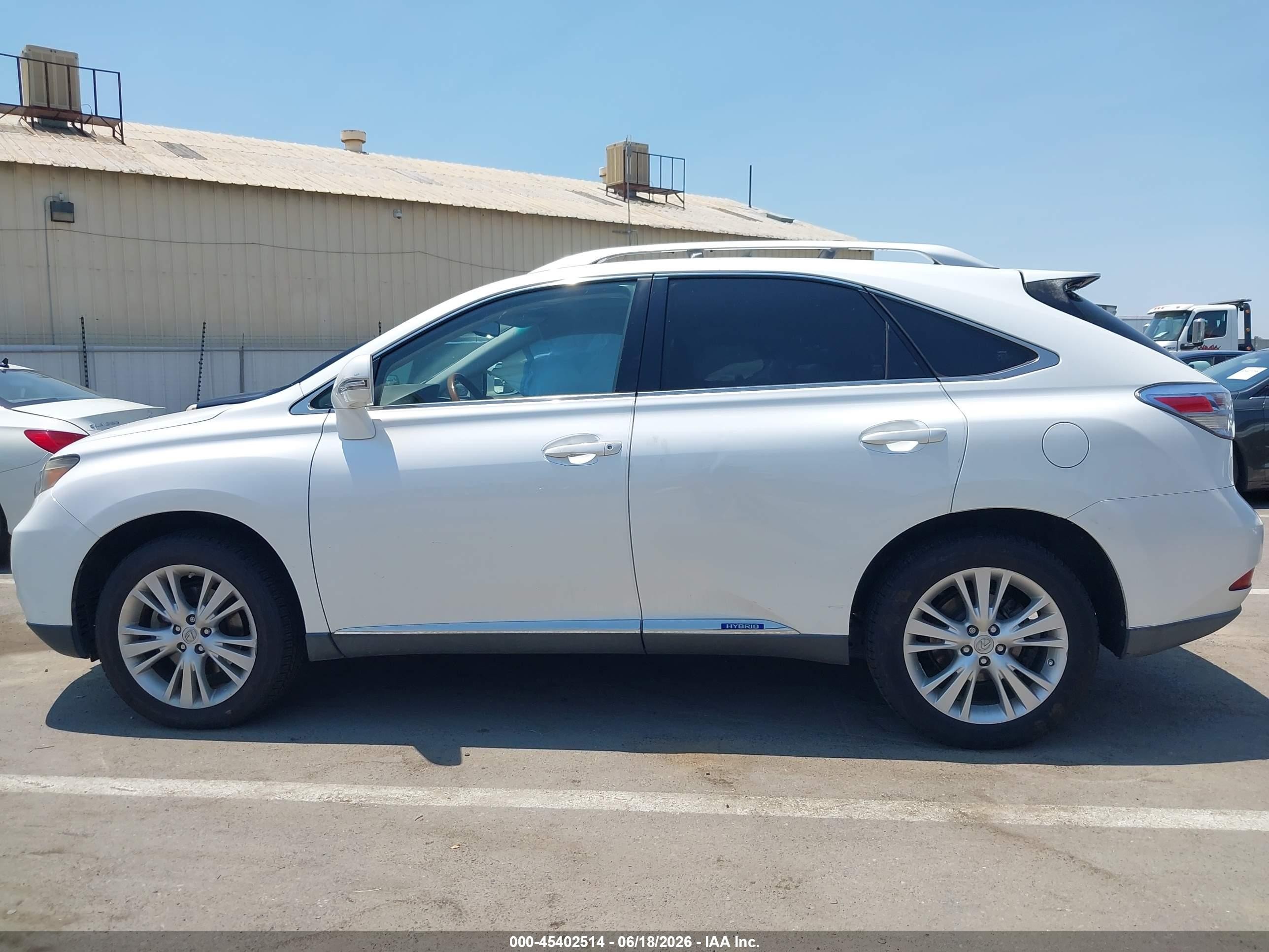 2012 Lexus Rx 450h   White vin: JTJBC1BA6C2425367
