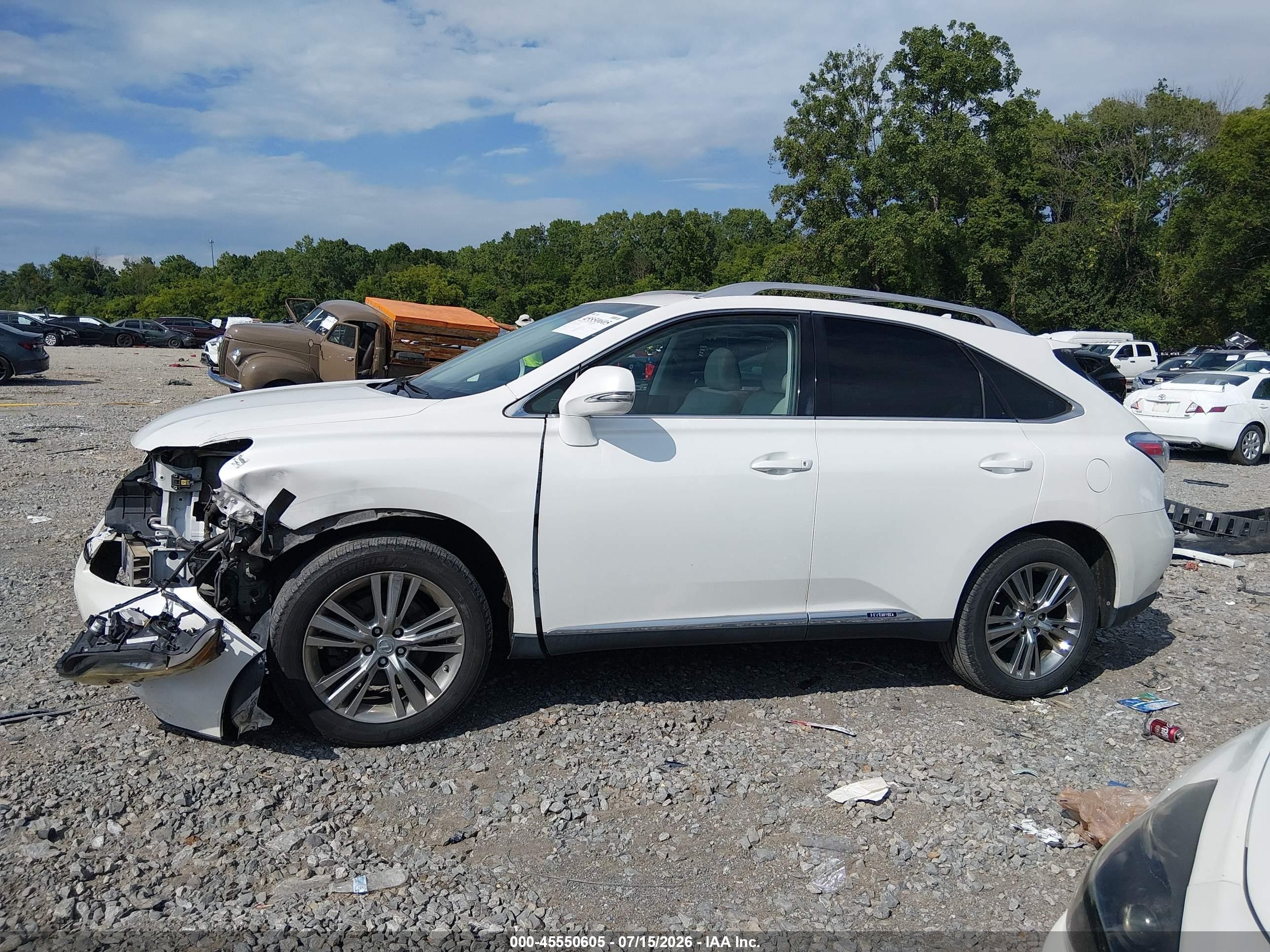 2012 Lexus Rx 450h   White vin: JTJBC1BA7C2429945