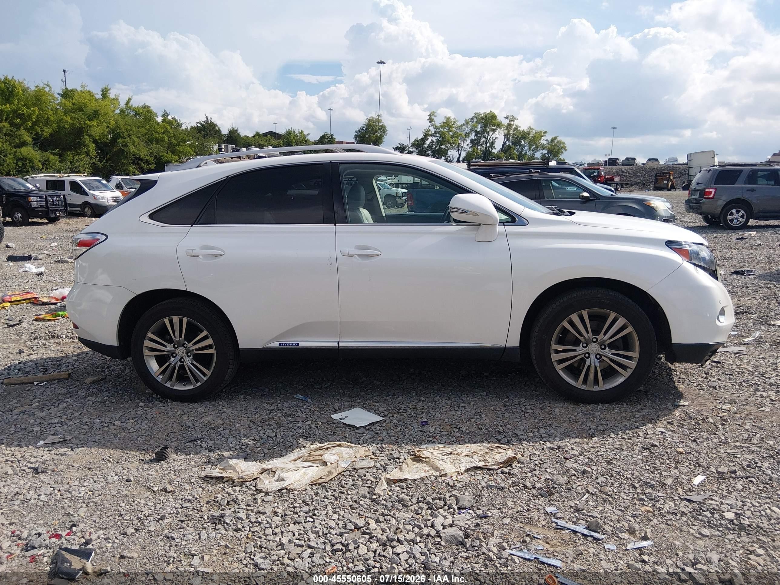 2012 Lexus Rx 450h   White vin: JTJBC1BA7C2429945