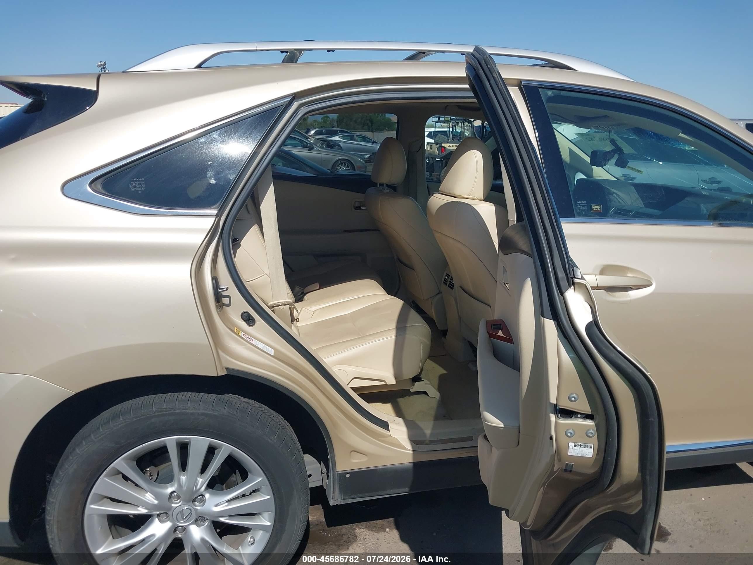 2010 Lexus Rx 450h   Золотой vin: JTJBC1BAXA2401876