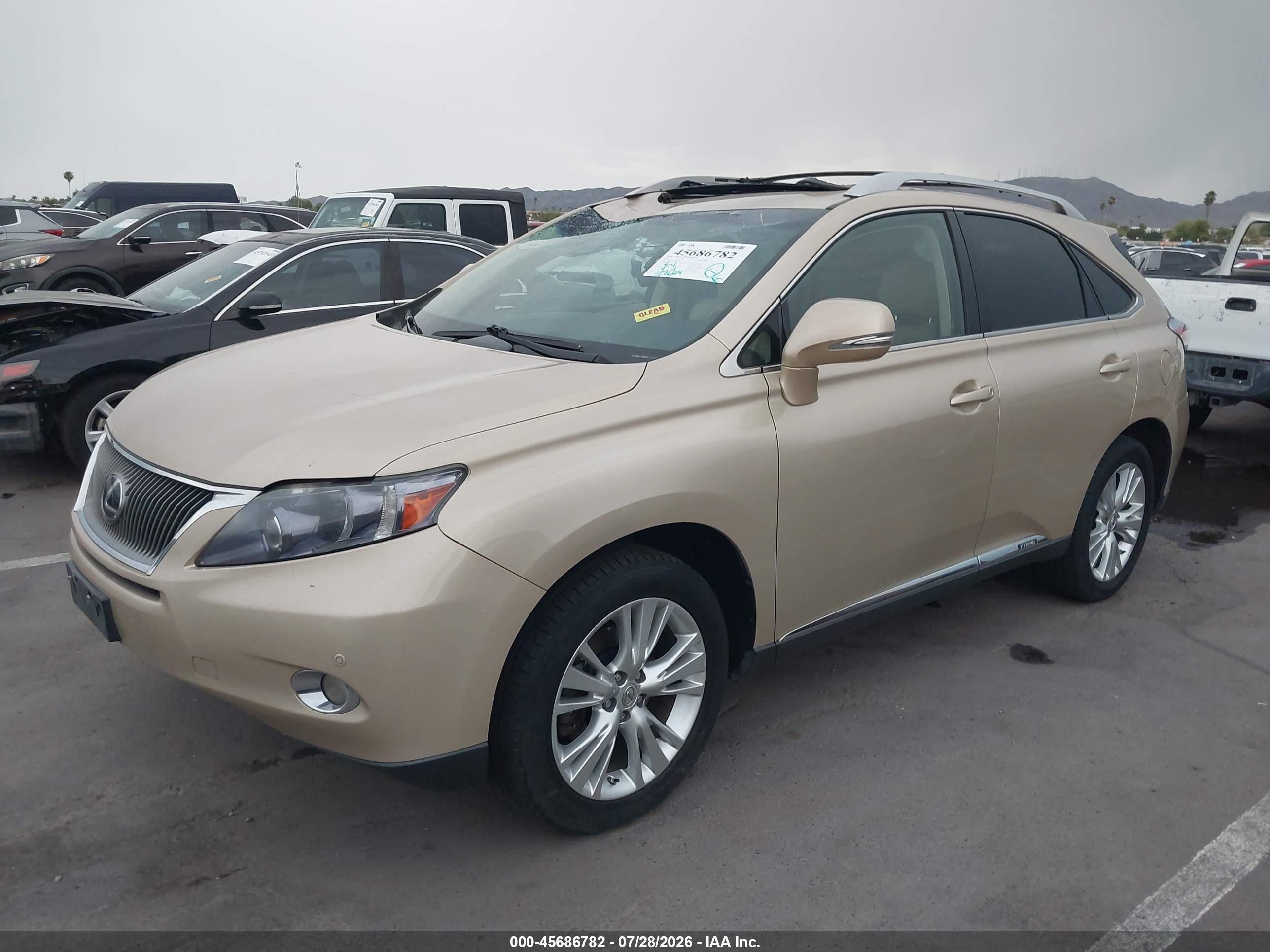 2010 Lexus Rx 450h   Золотой vin: JTJBC1BAXA2401876