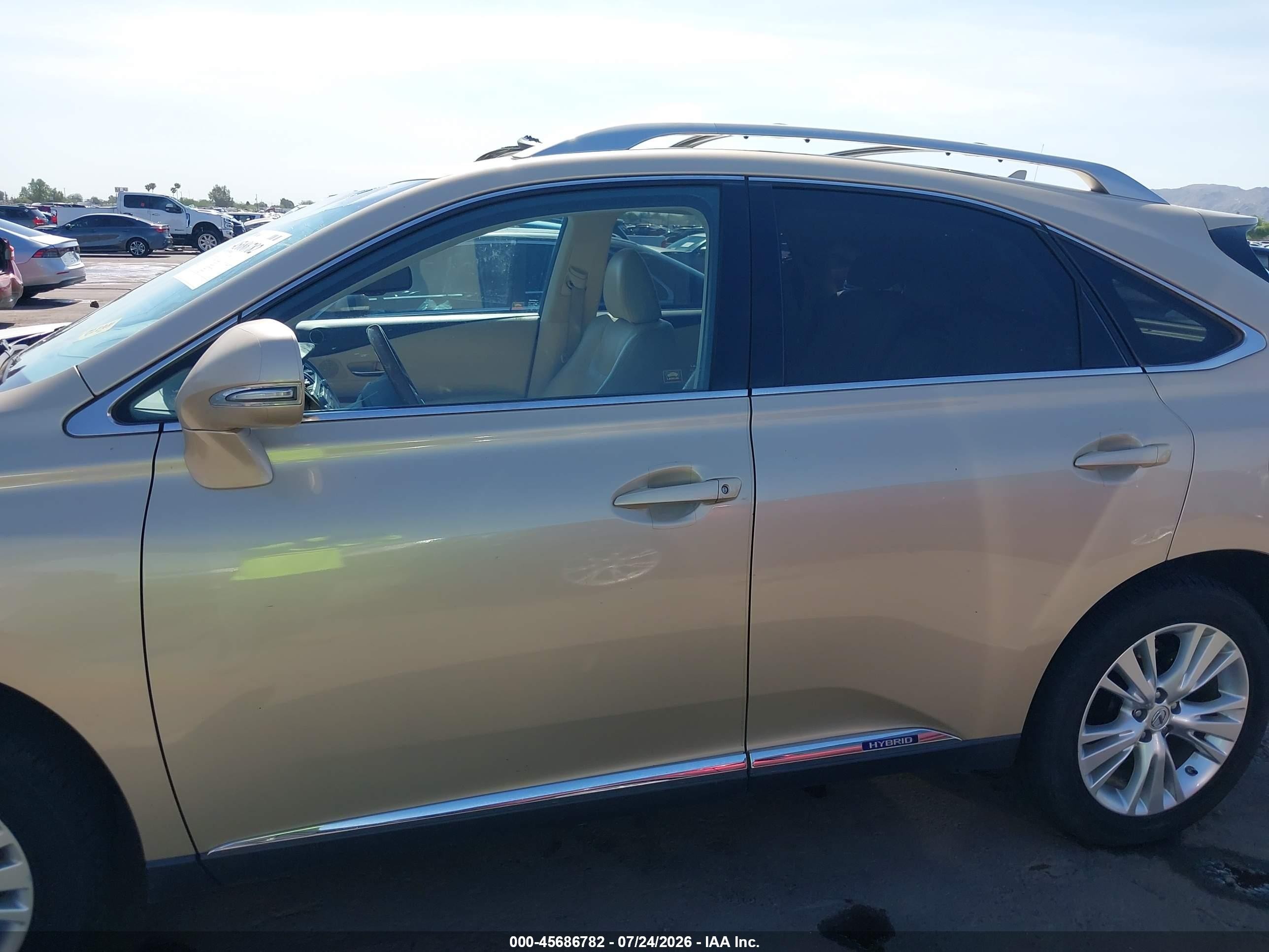 2010 Lexus Rx 450h   Золотой vin: JTJBC1BAXA2401876