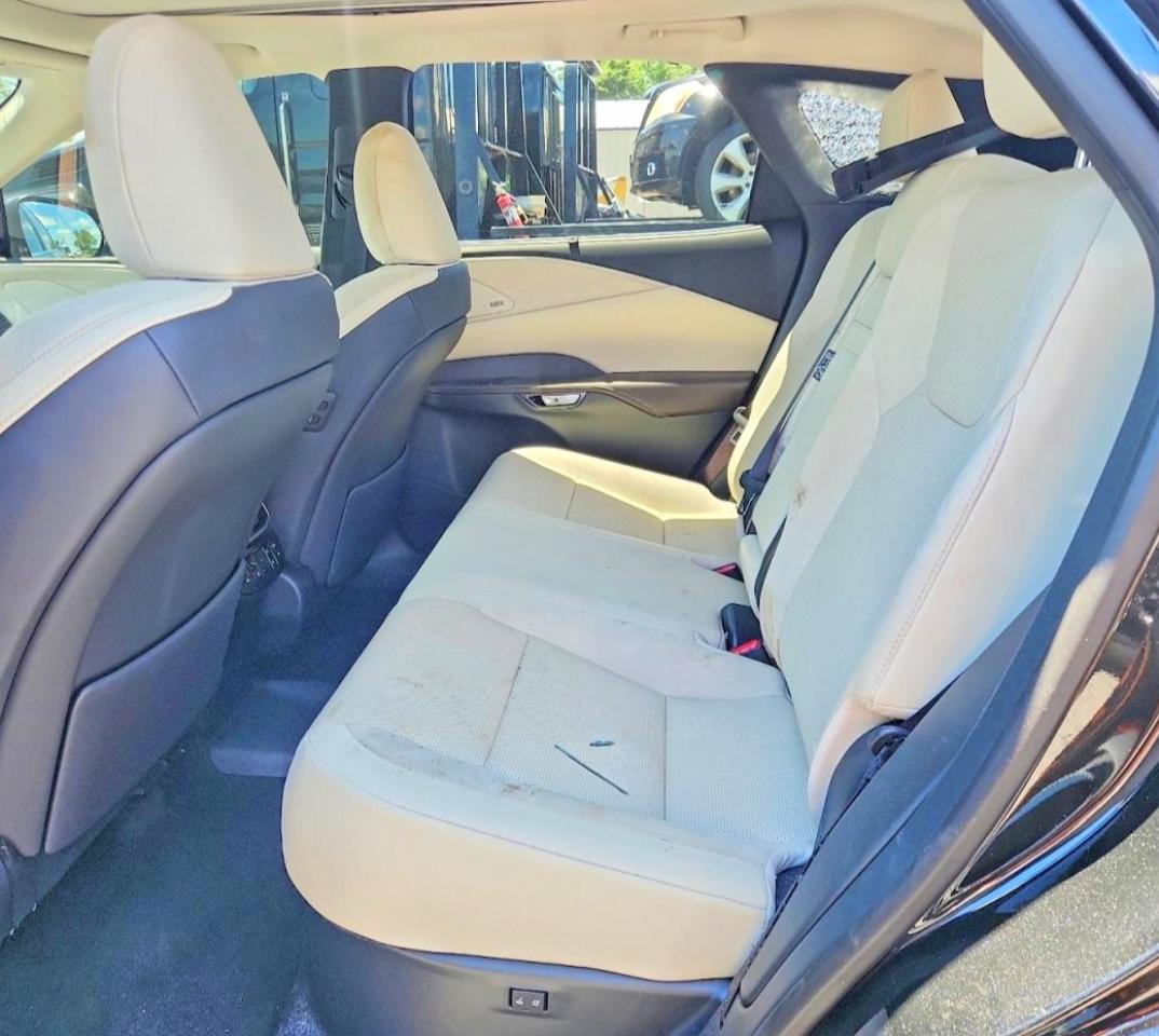 2026 Lexus Rx 450h+ Luxury Black vin: JTJCJMGA0T2037152