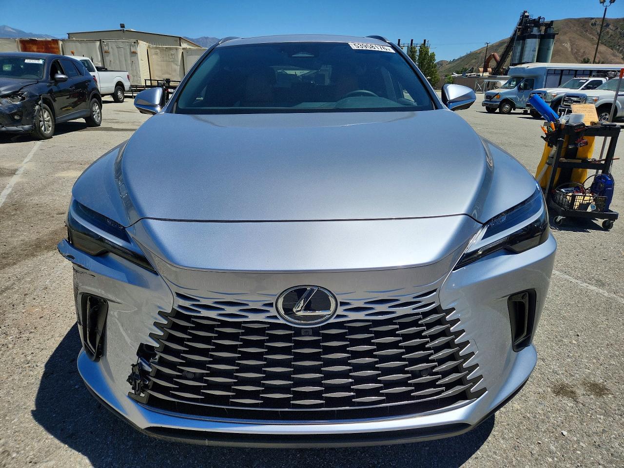 2026 Lexus Rx 450h+ Premium Silver vin: JTJCJMGA4T2042645