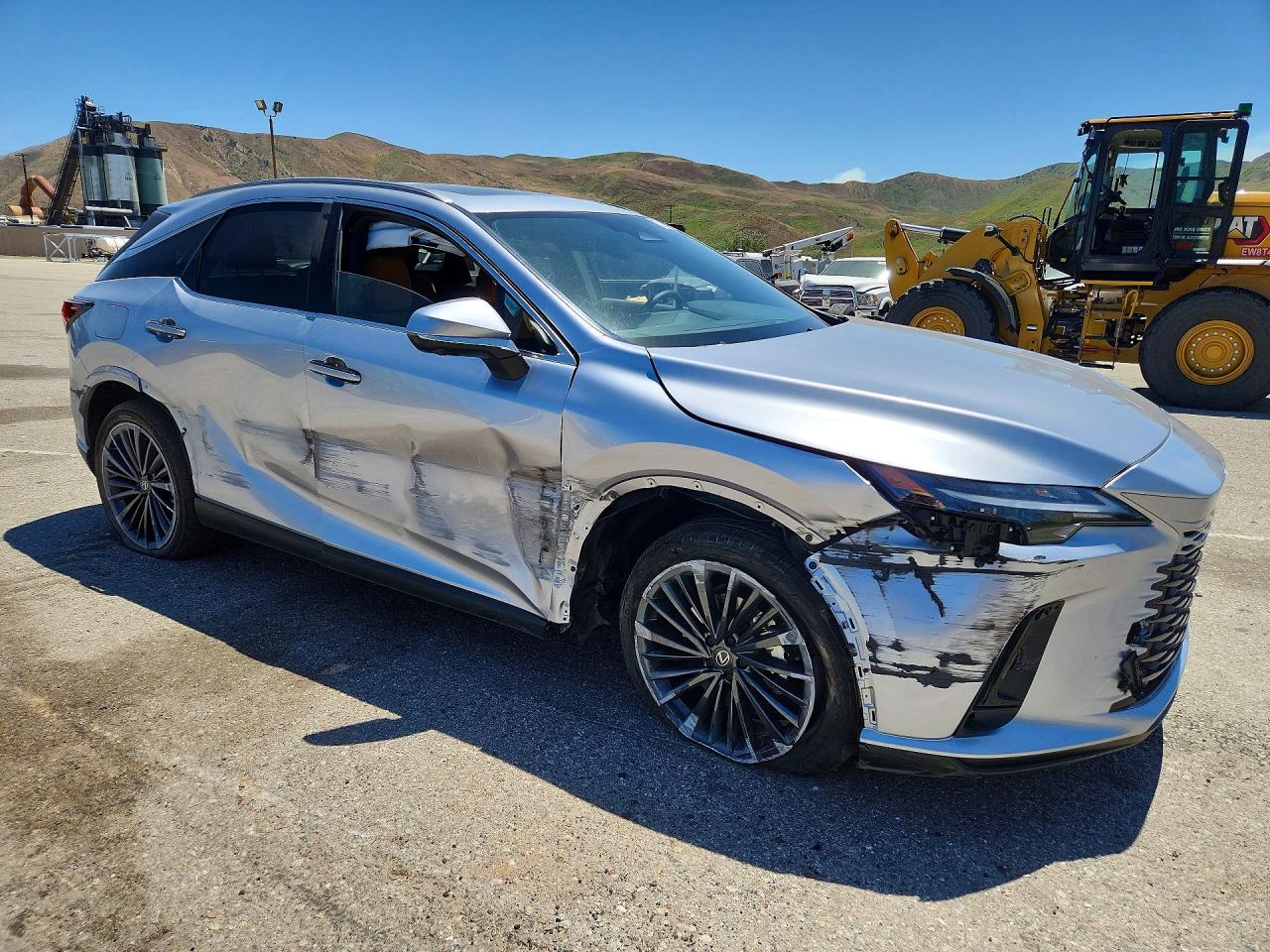 2026 Lexus Rx 450h+ Premium Silver vin: JTJCJMGA4T2042645