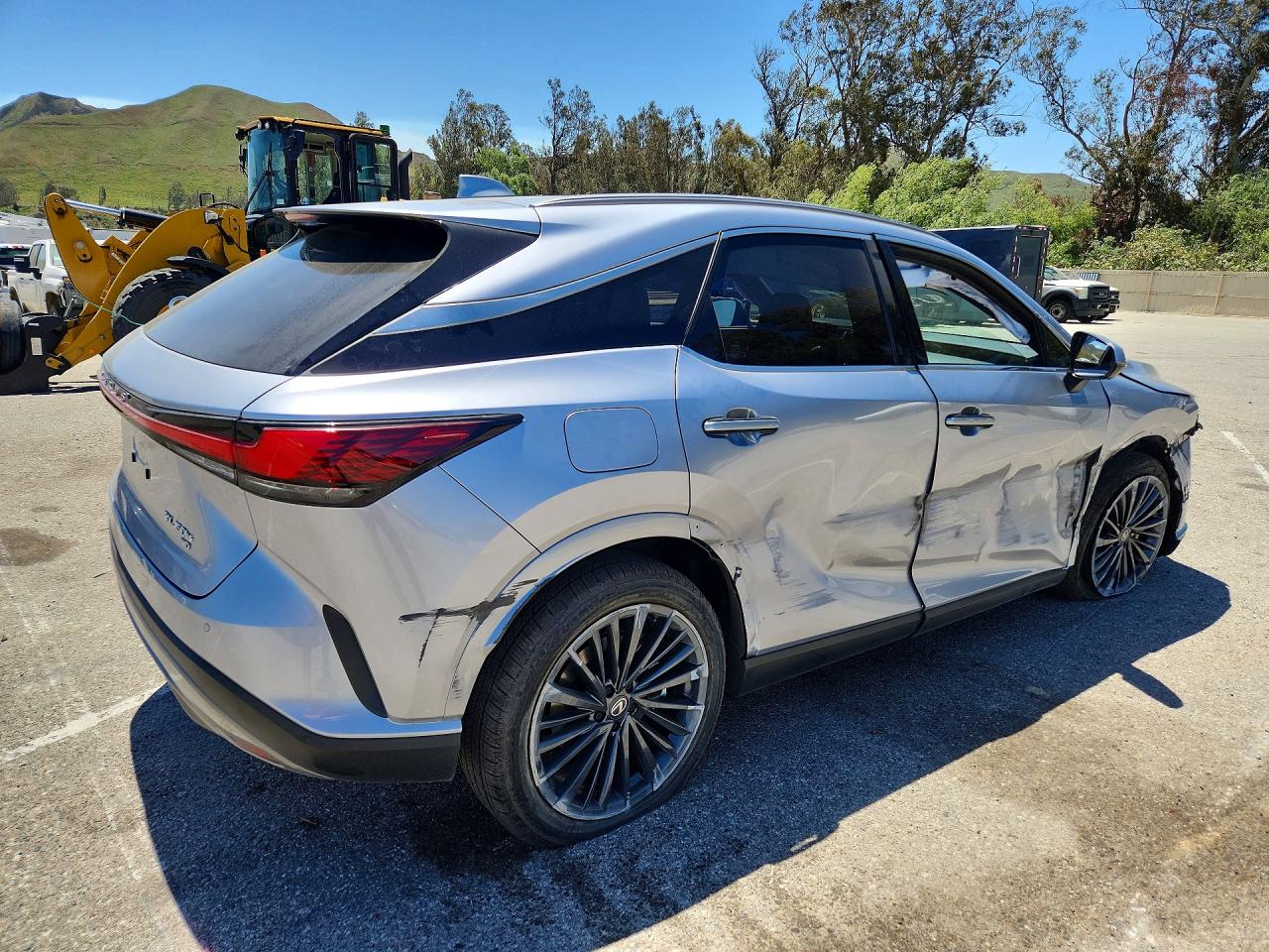 2026 Lexus Rx 450h+ Premium Silver vin: JTJCJMGA4T2042645