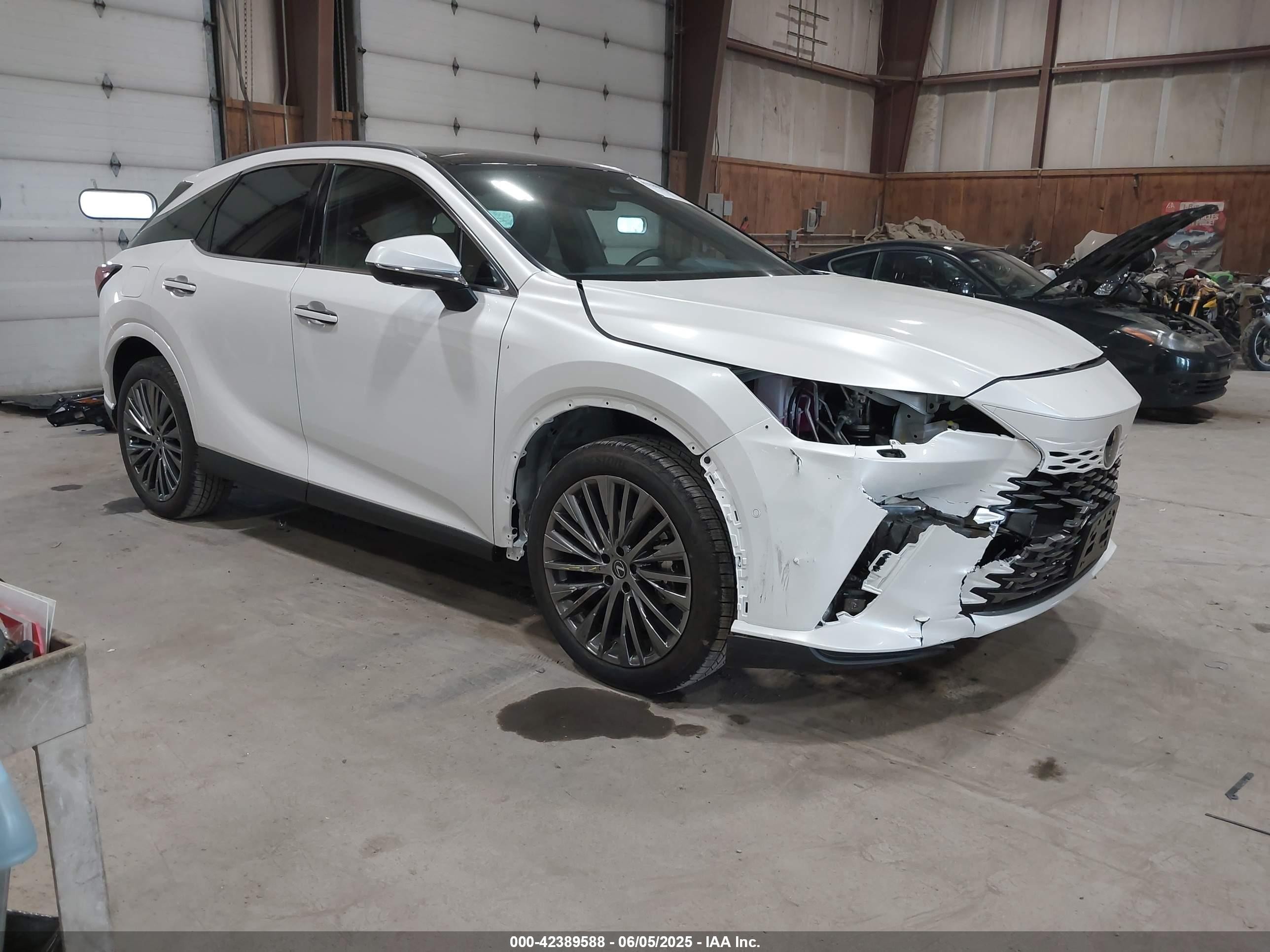 2025 Lexus Rx 450h+ Luxury White vin: JTJCJMGA6S2025585