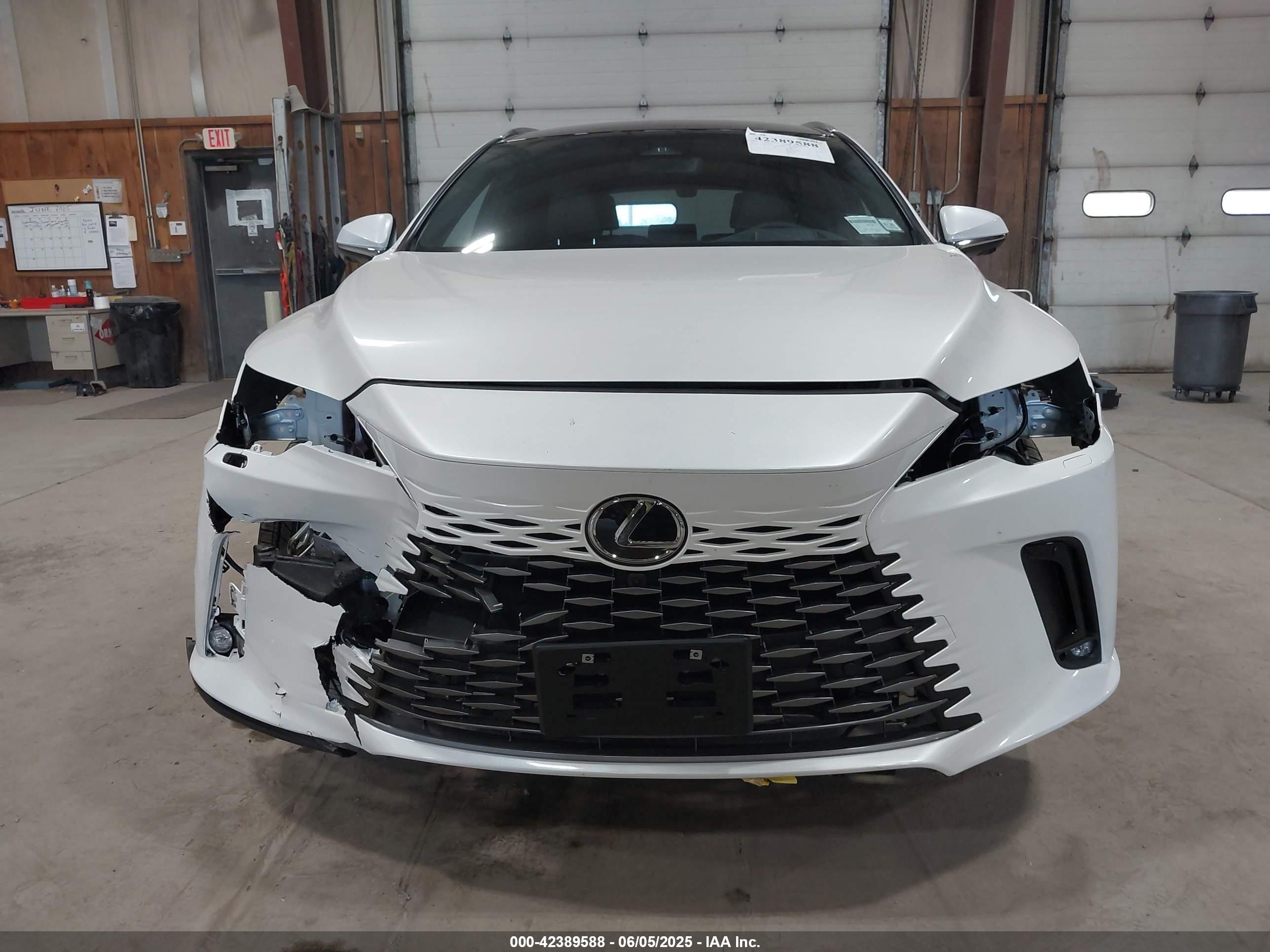 2025 Lexus Rx 450h+ Luxury White vin: JTJCJMGA6S2025585