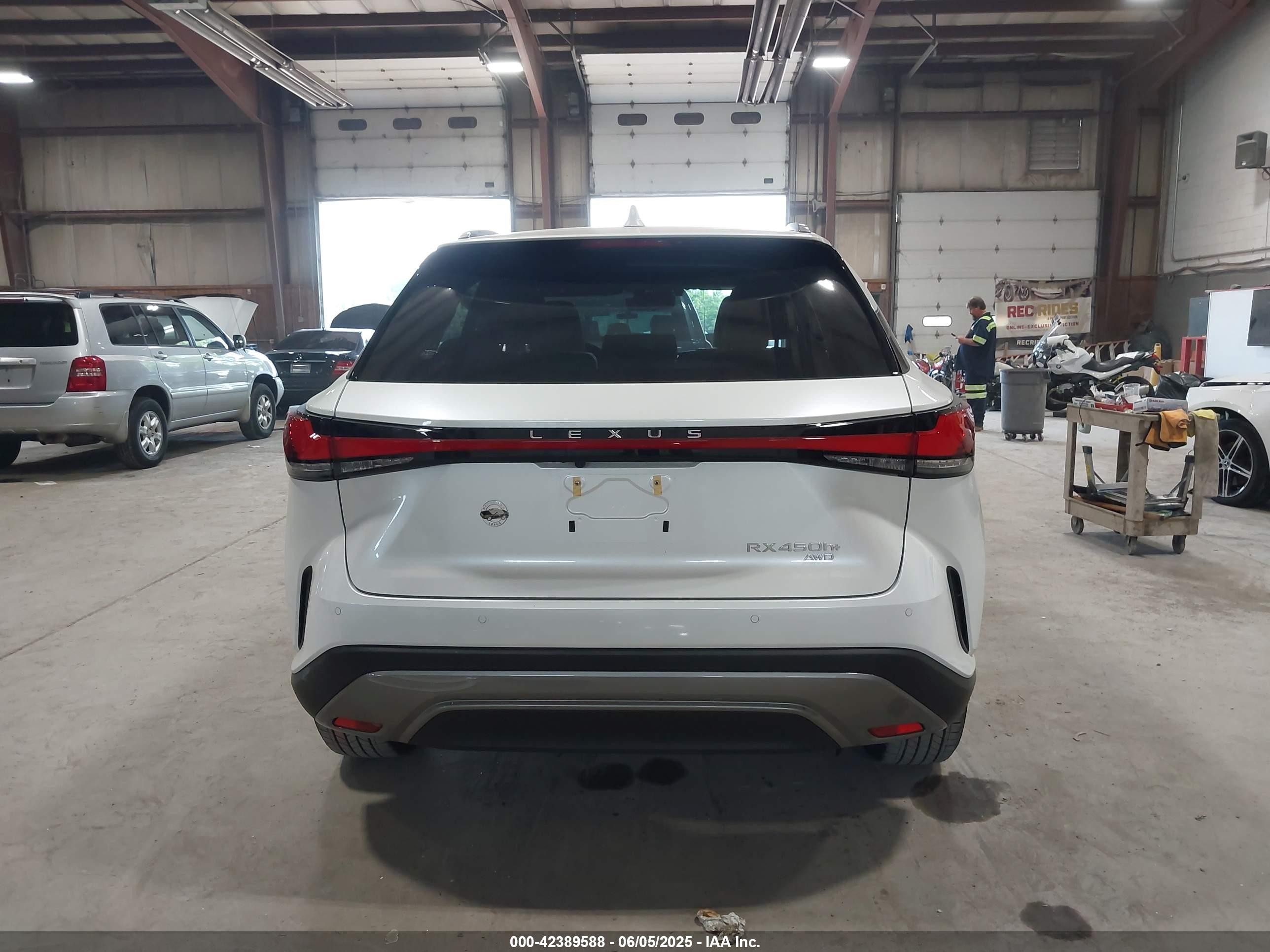 2025 Lexus Rx 450h+ Luxury White vin: JTJCJMGA6S2025585
