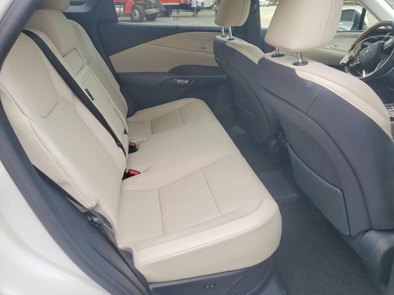 2024 Lexus Rx 450h+ Luxury White vin: JTJCJMGA7R2020552