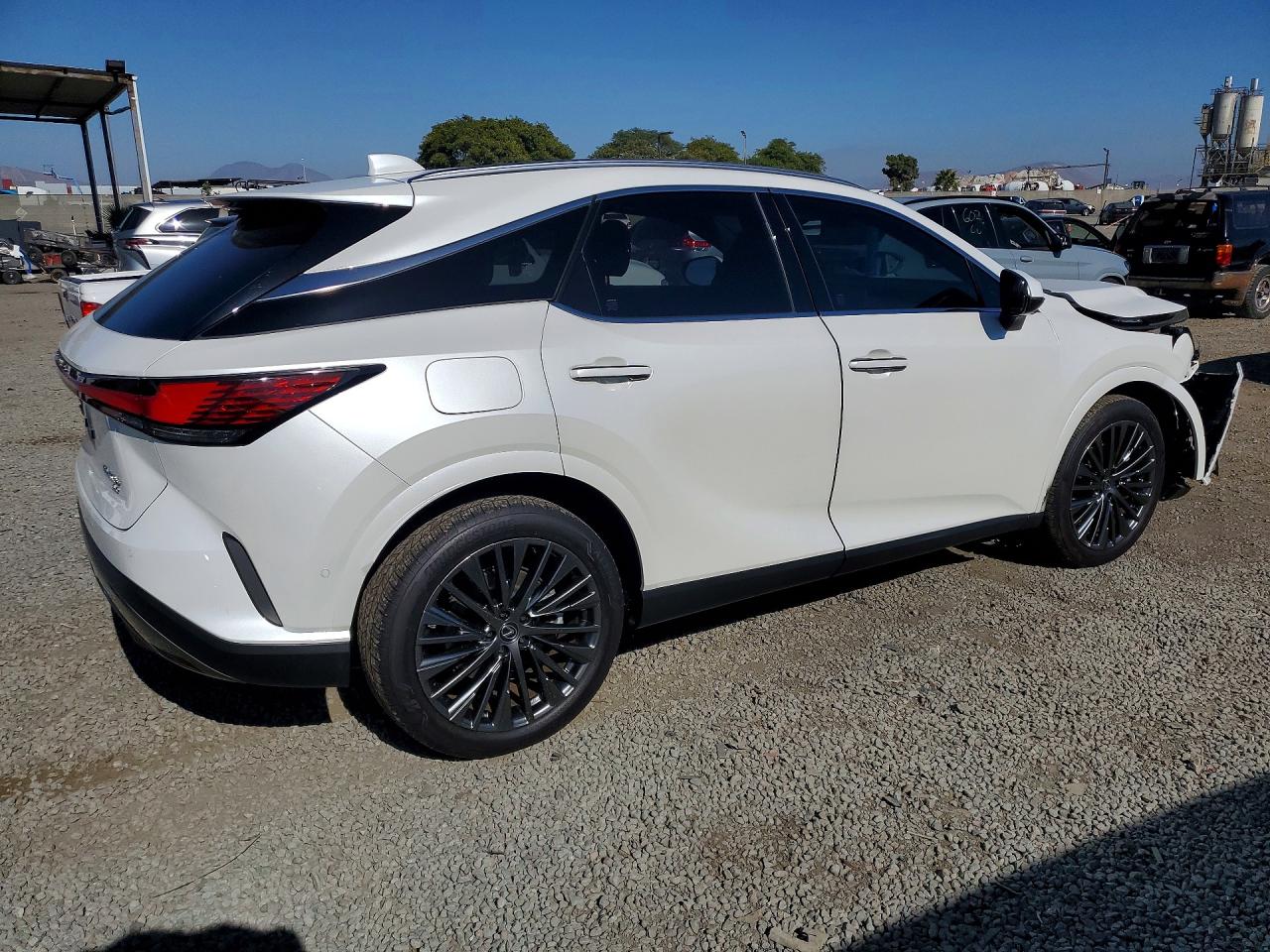 2025 Lexus Rx 450h+ Luxury White vin: JTJCJMGA9S2024690