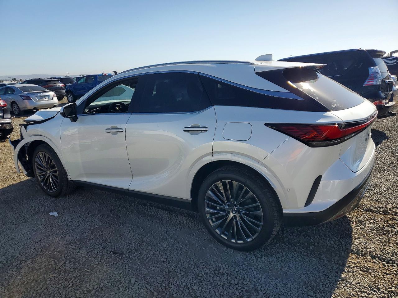 2025 Lexus Rx 450h+ Luxury White vin: JTJCJMGA9S2024690