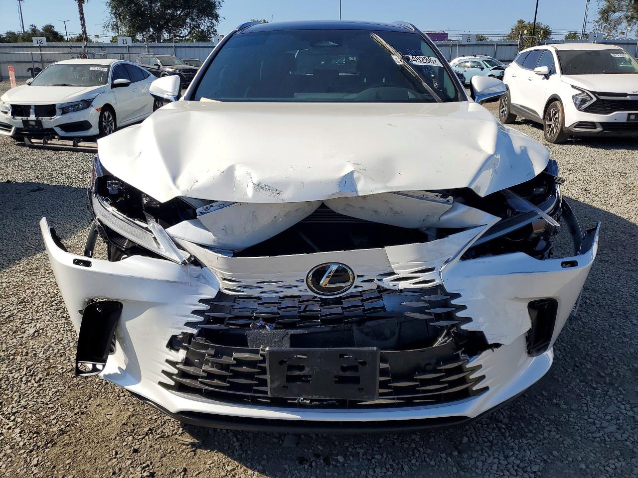 2025 Lexus Rx 450h+ Luxury White vin: JTJCJMGA9S2024690