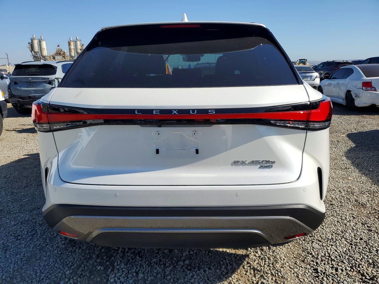 2025 Lexus Rx 450h+ Luxury White vin: JTJCJMGA9S2024690