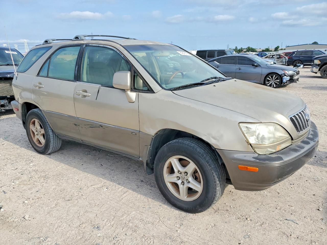 2002 Lexus Rx 300 Gold vin: JTJGF10U720142027