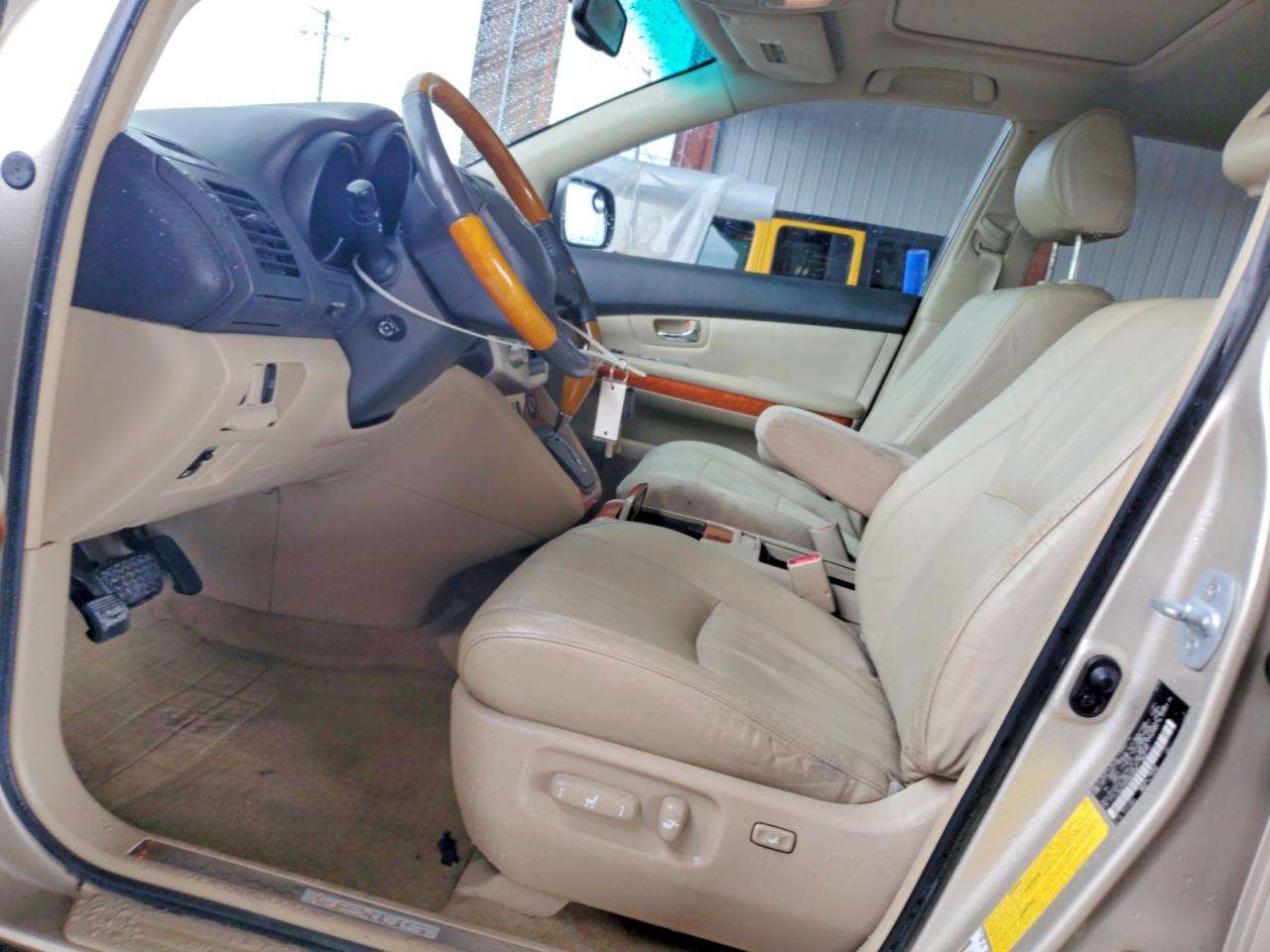2007 Lexus Rx 400h Tan vin: JTJGW31U472003303