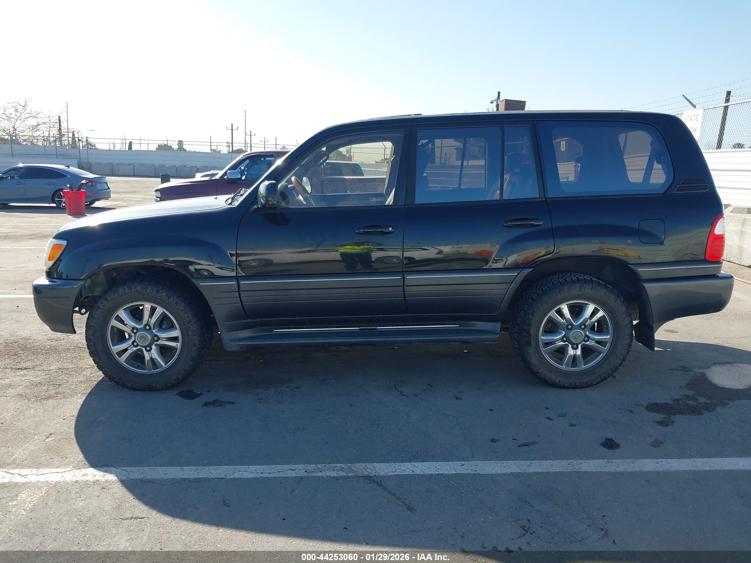 2003 Lexus Lx 470   Black vin: JTJHT00W633533646