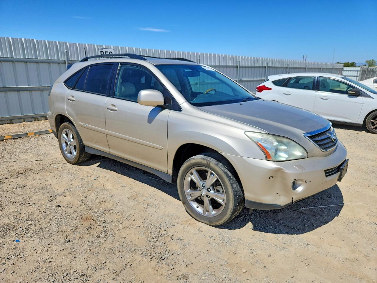 2007 Lexus Rx 400h Gold vin: JTJHW31UX72031627