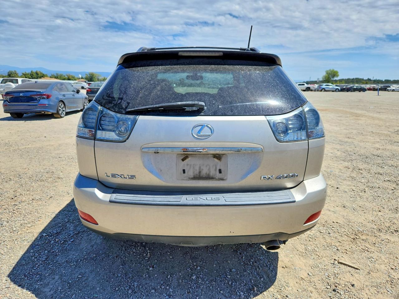 2007 Lexus Rx 400h Gold vin: JTJHW31UX72031627