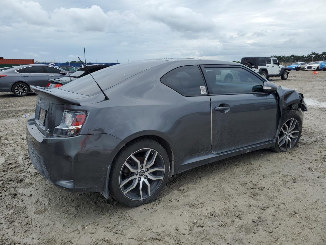2014 Toyota Scion Tc Серый vin: JTKJF5C77E3086625