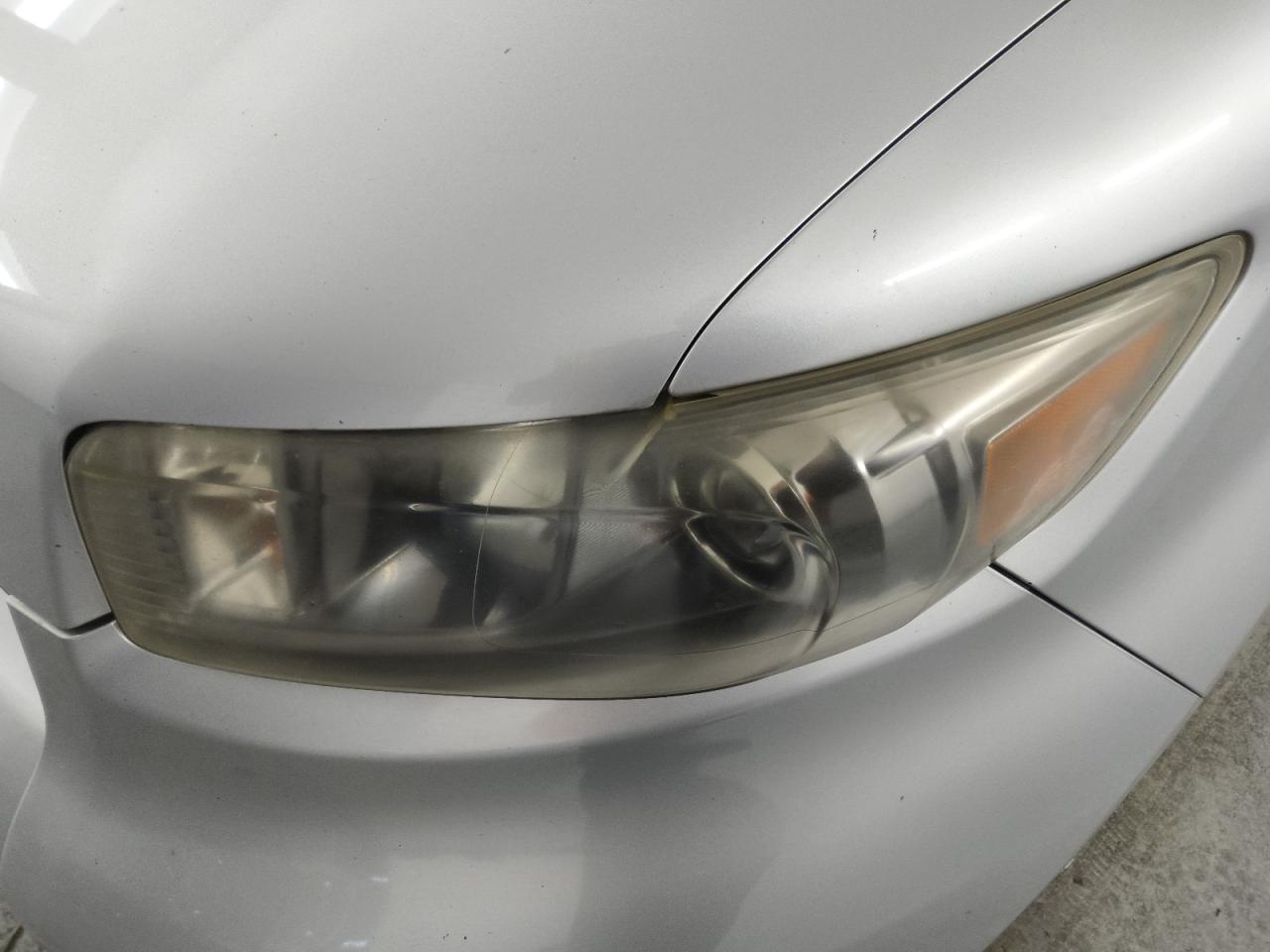 2008 Toyota Scion Xb Silver vin: JTLKE50EX81016963 Damage: Left Head Lamp, Faded, Repair Required