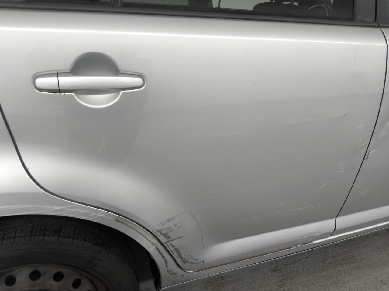 2008 Toyota Scion Xb Silver vin: JTLKE50EX81016963 Damage: Right Rear Door, Dent(S) W/No Paint Dmg, 5 To 6 Inches