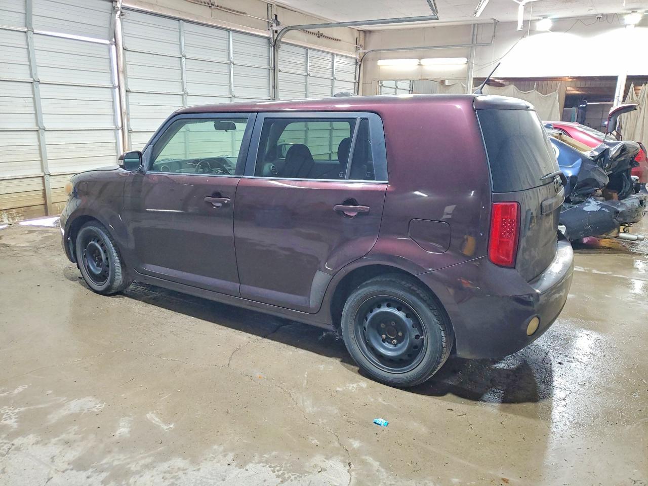 2009 Toyota Scion Xb Purple vin: JTLKE50EX91073049