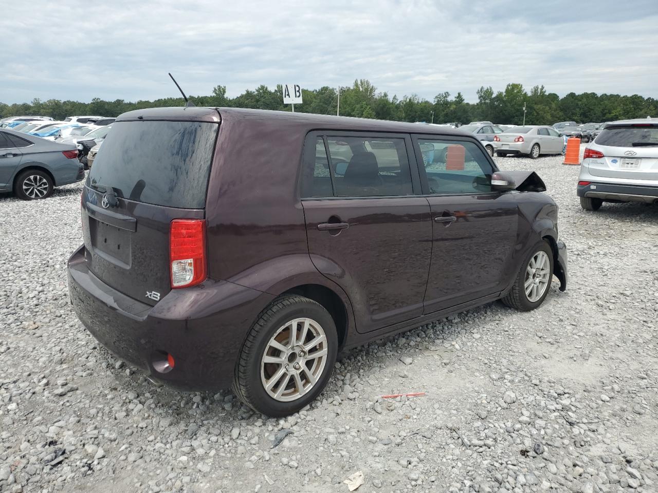 2011 Toyota Scion Xb Burgundy vin: JTLZE4FE5B1140212