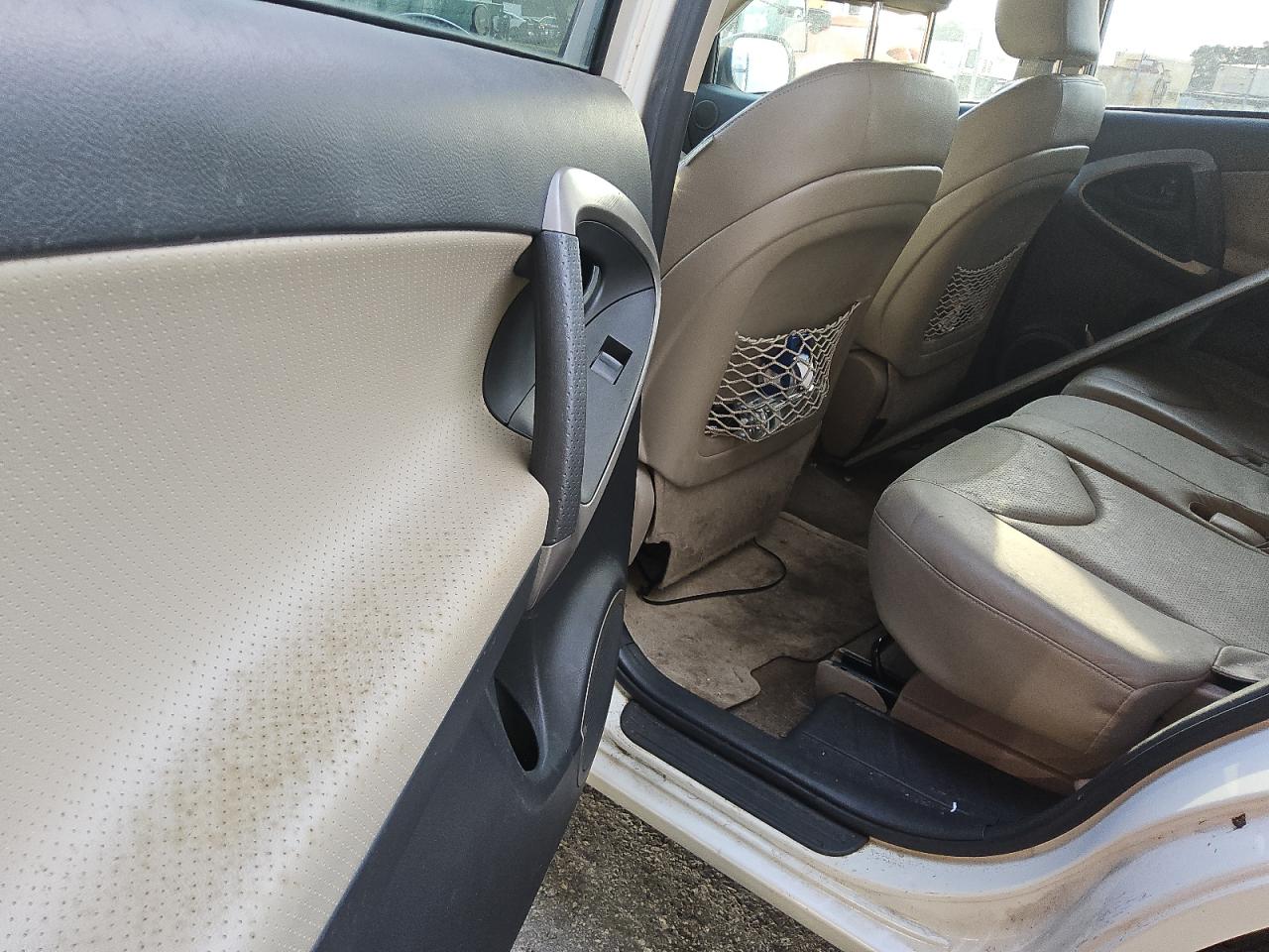 2008 Toyota Rav4 Limited White vin: JTMBD31V385154614 Damage: Left Rear Door Panel, Stained, Permanent