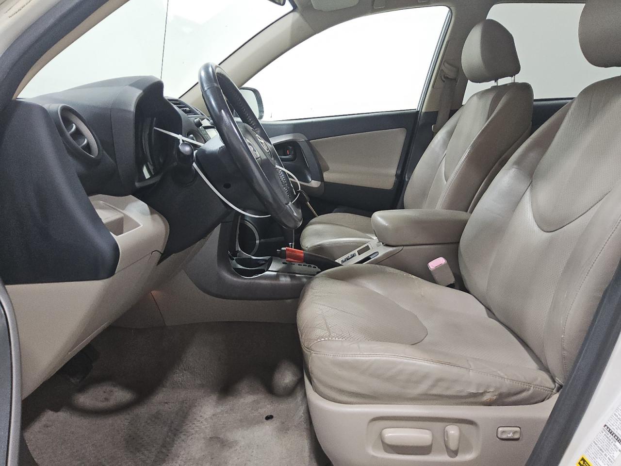 2008 Toyota Rav4 Limited White vin: JTMBD31V385154614 Damage: Left Front Seat Cushion, Torn, 3 To 4 Inches