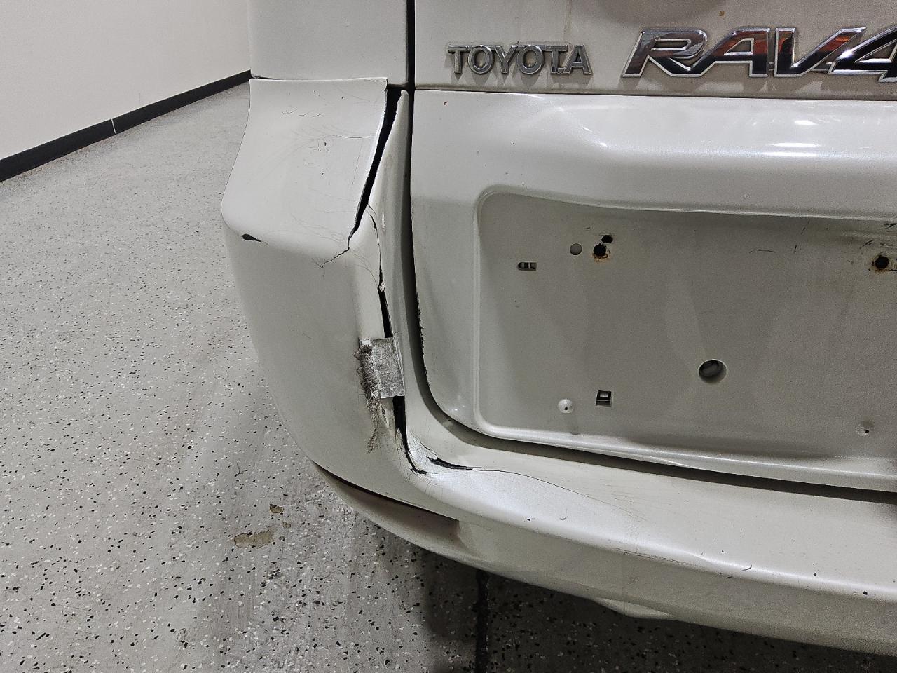 2008 Toyota Rav4 Limited White vin: JTMBD31V385154614 Damage: Rear Bumper, Cracked, > 12 Inches