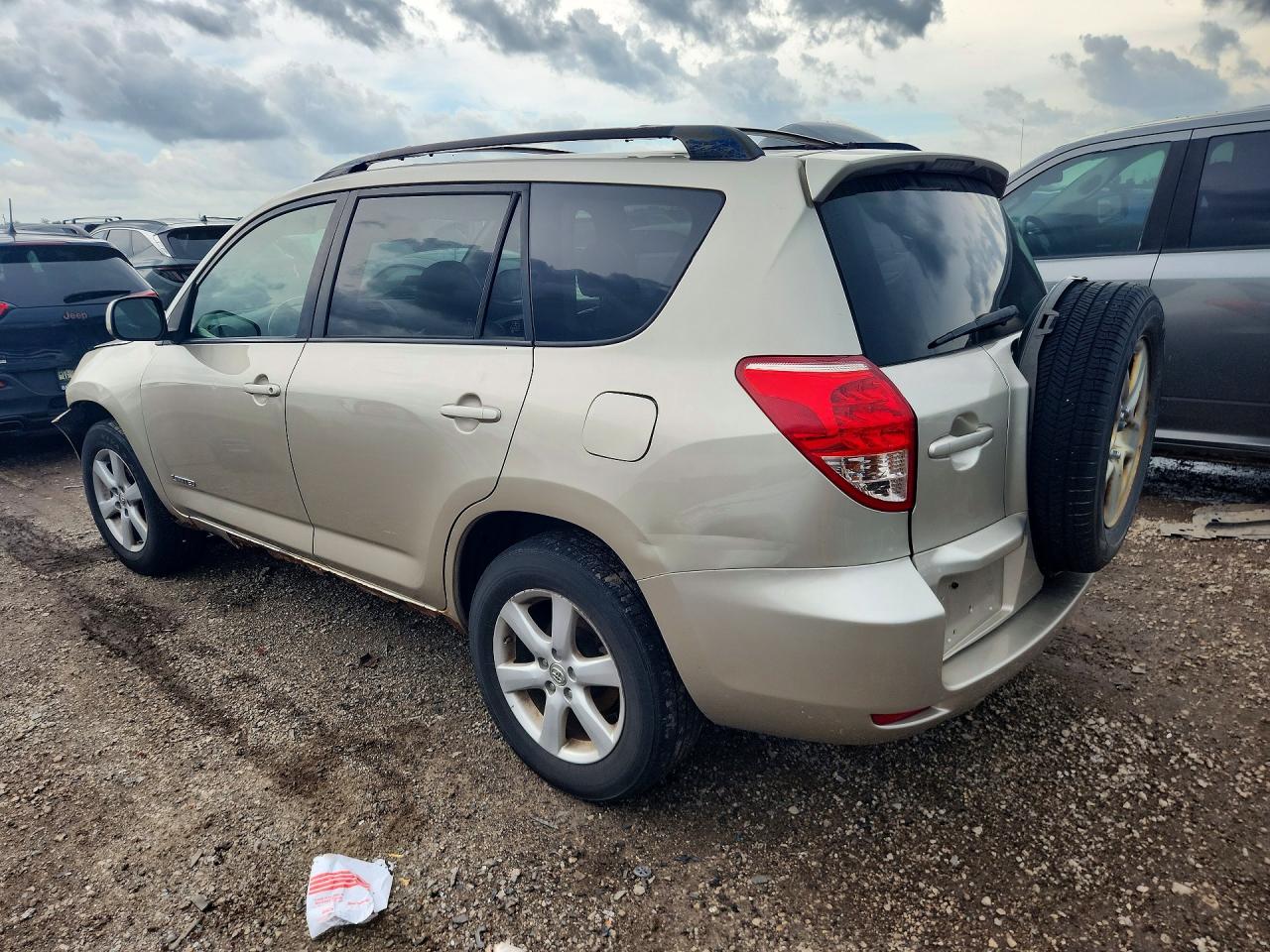 2007 Toyota Rav4 Limited Gold vin: JTMBD31V876037703