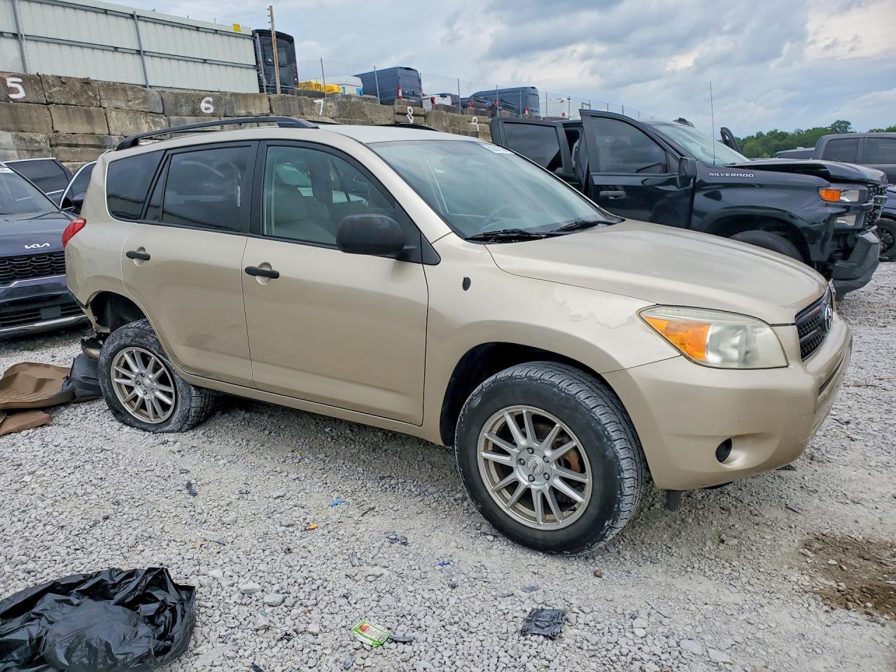 2007 Toyota Rav4 Base Gold vin: JTMBD33V676033985