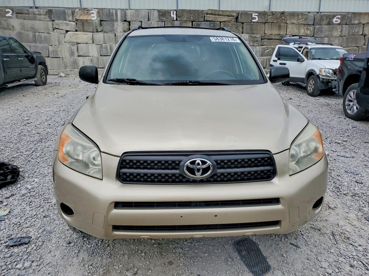 2007 Toyota Rav4 Base Gold vin: JTMBD33V676033985